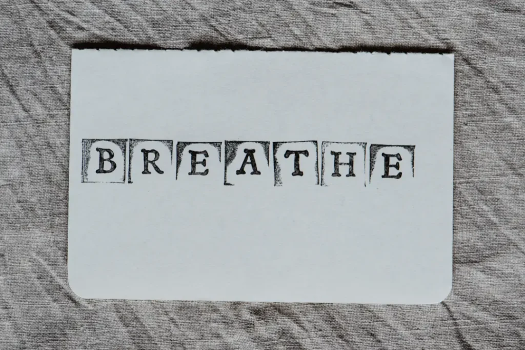 breathe written on a piece of paper