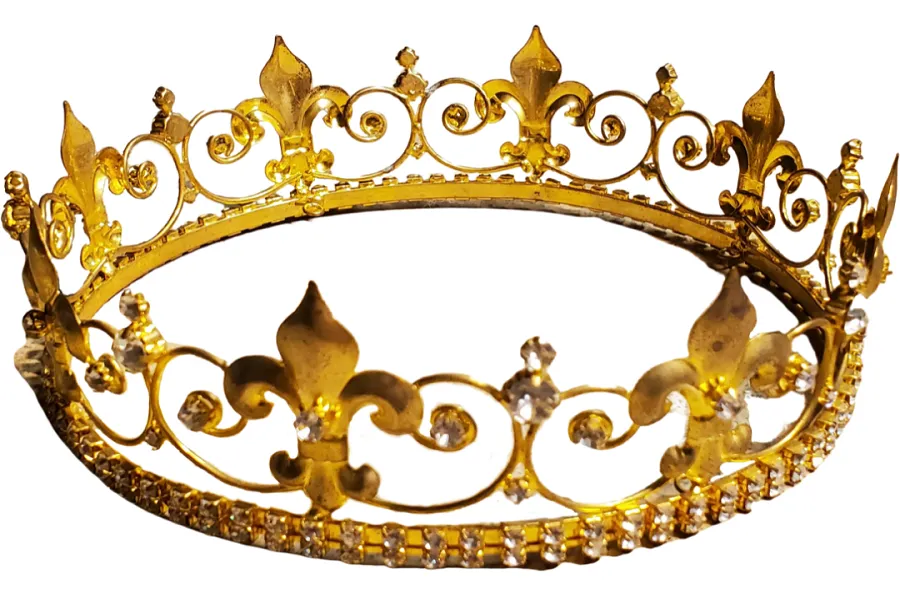 A luxurious gold crown adorned with a large diamond on top